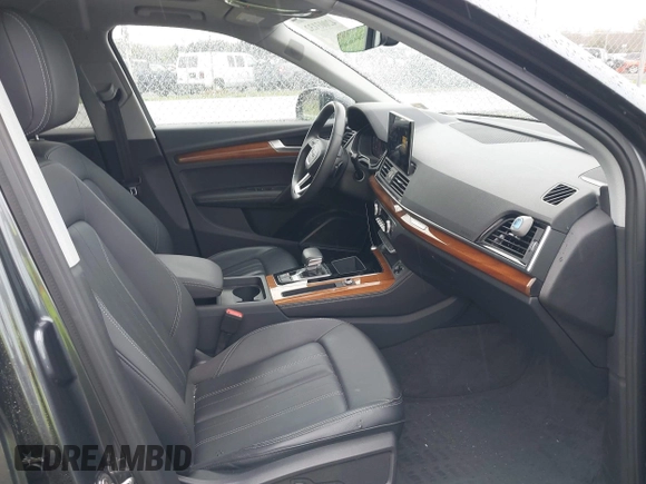 2023 Audi Q5 S line Premium Plus z VIN WA1EAAFY1P2044460, wystawiony jako IAAI lot #42003132 z przebiegiem 28 434 mil mil oraz . Historia ofert i sprzedaży dostępna na DreamBid. Obrazek 5.