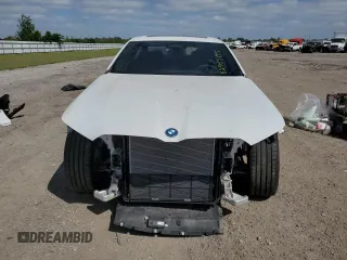 2024 BMW i5 eDrive40 with VIN WBY33FK05RCR50188, listed as a Copart auction lot 52953195 with 423 mi miles and Salvage title. Bid and sale history available at DreamBid. Image 5.