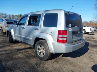 2010 Jeep Liberty Sport with VIN 1J4PN2GK5AW131498, listed as a IAAI auction lot 41099298 with 142,735 mi miles. Bid and sale history available at carsss.com. Image 3.