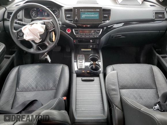 2023 Honda Passport Elite with VIN 5FNYF8H05PB013536, listed as a Copart auction lot 50671155 with 33,815 mi miles and Salvage Title. Bid and sale history available at DreamBid. Image 8.