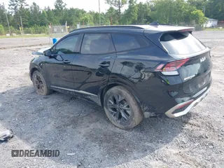 2023 Kia Sportage SX-Prestige with VIN KNDPXCAG1P7020251, listed as a IAAI auction lot 42364221 with 129,885 mi miles and . Bid and sale history available at DreamBid. Image 3.