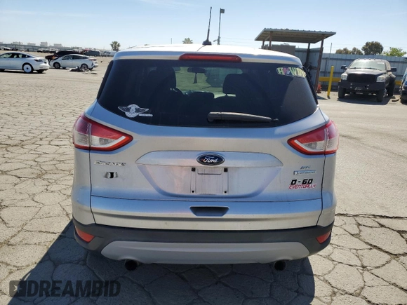 2013 Ford Escape SE with VIN 1FMCU0GX1DUC86164, listed as a Copart auction lot 56565575 with 134,118 mi miles and Clean Title. Bid and sale history available at DreamBid. Image 6.