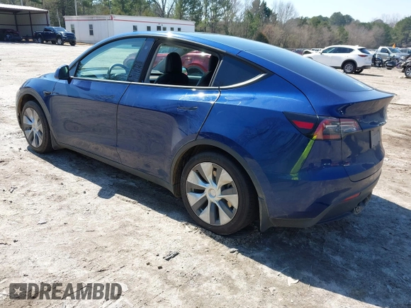 2021 Tesla Model Y Long Range with VIN 5YJYGAEE1MF207948, listed as a IAAI auction lot 41779570 with 100,859 mi miles. Bid and sale history available at carsss.com. Image 3.