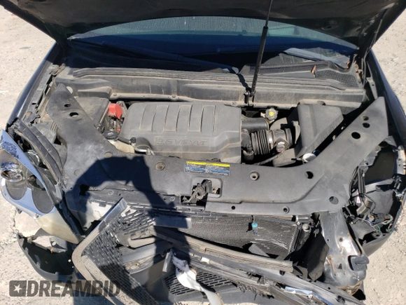2007 GMC Acadia SLT z VIN 1GKER33787J126217, wystawiony jako Copart lot #75482594 z przebiegiem 211 747 mil mil oraz Szkoda całkowita • Salvage title. Historia ofert i sprzedaży dostępna na DreamBid. Obrazek 13.