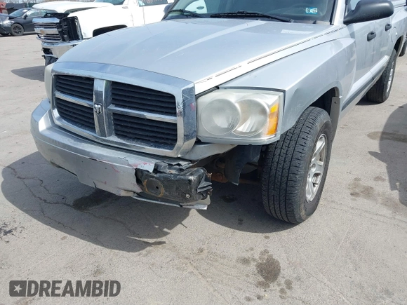 2007 Dodge Dakota SLT with VIN 1D7HE48K57S147503, listed as a IAAI auction lot 41858271 with 242,534 mi miles and . Bid and sale history available at DreamBid. Image 6.