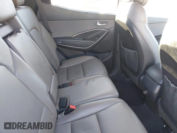 2017 Hyundai Santa Fe 2.4L z VIN 5XYZU3LB4HG435992, wystawiony jako IAAI lot #40927607 z przebiegiem 104 868 mil mil oraz . Historia ofert i sprzedaży dostępna na DreamBid. Obrazek 8.