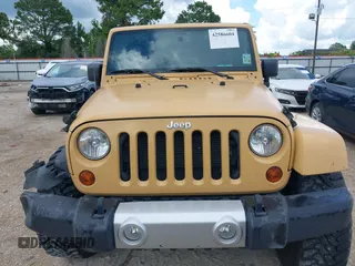2013 Jeep Wrangler Unlimited Sahara with VIN 1C4BJWEG8DL638404, listed as a IAAI auction lot 42586604 with 43,953 mi miles and . Bid and sale history available at DreamBid. Image 12.