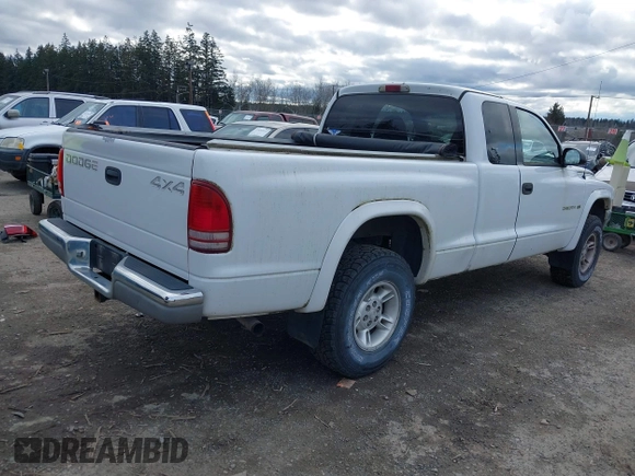 1997 Dodge Dakota z VIN 1B7GG23X5VS242535, wystawiony jako IAAI lot #41608146 z przebiegiem 125 189 mil mil oraz . Historia ofert i sprzedaży dostępna na DreamBid. Obrazek 4.
