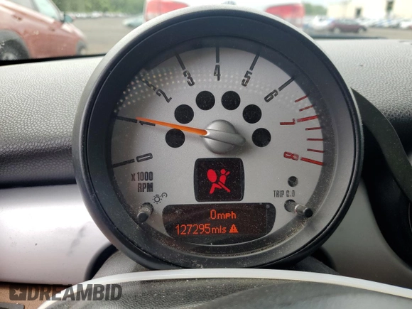 2013 MINI Hardtop with VIN WMWSU3C51DT374477, listed as a Copart auction lot 62654295 with 127,295 mi miles and Salvage title. Bid and sale history available at DreamBid. Image 9.