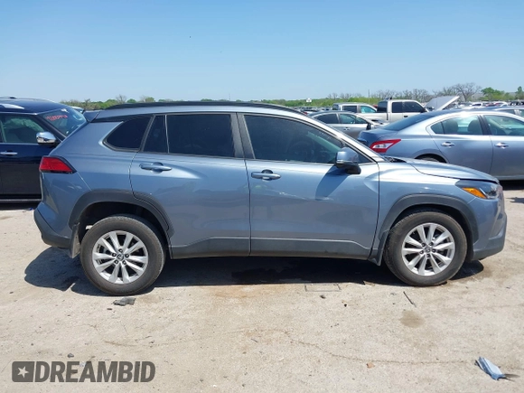 2023 Toyota Corolla Cross LE with VIN 7MUCAAAGXPV045651, listed as a IAAI auction lot 42006289 with 23,282 mi miles and . Bid and sale history available at DreamBid. Image 13.