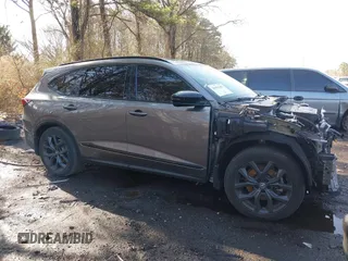 2022 Acura MDX w/A-Spec Package with VIN 5J8YE1H09NL035478, listed as a IAAI auction lot 41911403 with 77,529 mi miles. Bid and sale history available at carsss.com. Image 13.