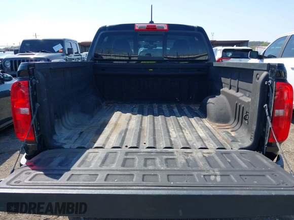 2018 Chevrolet Colorado 4WD Z71 z VIN 1GCGTDEN0J1173420, wystawiony jako IAAI lot #41971813 z przebiegiem 98 499 mil mil oraz . Historia ofert i sprzedaży dostępna na DreamBid. Obrazek 17.