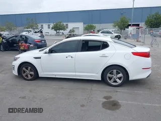 2015 Kia Optima LX with VIN KNAGM4A74F5662579, listed as a IAAI auction lot 42127251 with 144,138 mi miles and . Bid and sale history available at carsss.com. Image 13.