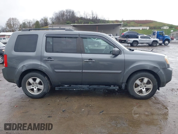2011 Honda Pilot EX-L with VIN 5FNYF4H67BB001622, listed as a IAAI auction lot 41954379 with 157,910 mi miles and . Bid and sale history available at carsss.com. Image 13.