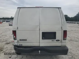 2010 Ford Econoline Cargo Commercial with VIN 1FTNE2EW5ADA87906, listed as a Copart auction lot 70585604 with 302,164 mi miles and Salvage title. Bid and sale history available at DreamBid. Image 6.