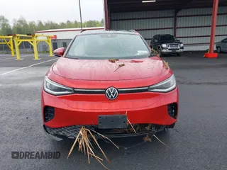 2023 Volkswagen ID.4 Pro S z VIN 1V2FMPE83PC010566, wystawiony jako IAAI lot #42255980 z przebiegiem Nie podano mil oraz . Historia ofert i sprzedaży dostępna na DreamBid. Obrazek 12.