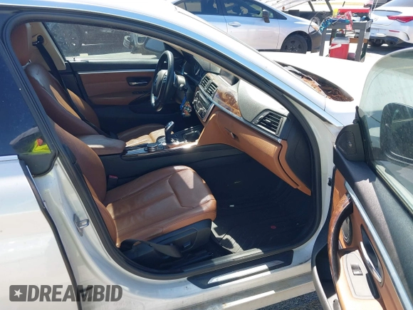 2015 BMW 4 Series 428i with VIN WBA4A5C58FGK15335, listed as a IAAI auction lot 41723243 with 152,652 mi miles and . Bid and sale history available at DreamBid. Image 5.