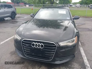2015 Audi A6 Premium Plus z VIN WAUGFAFC6FN028169, wystawiony jako IAAI lot #42273931 z przebiegiem 100 056 mil mil oraz . Historia ofert i sprzedaży dostępna na DreamBid. Obrazek 12.