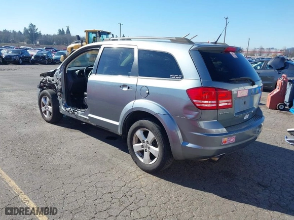 2010 Dodge Journey SXT with VIN 3D4PG5FV3AT146880, listed as a IAAI auction lot 41648379 with 123,341 mi miles. Bid and sale history available at carsss.com. Image 3.