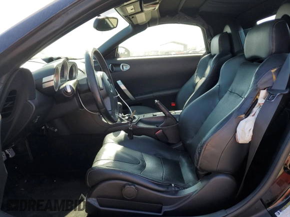 2004 Nissan 350Z Touring with VIN JN1AZ36A74T002301, listed as a Copart auction lot 61720524 with 101,779 mi miles and Salvage Title. Bid and sale history available at carsss.com. Image 7.