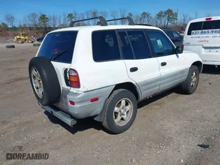 1998 Toyota RAV4 with VIN JT3GP10V9W7038486, listed as a IAAI auction lot 41778465 with 157,143 mi miles. Bid and sale history available at carsss.com. Image 4.