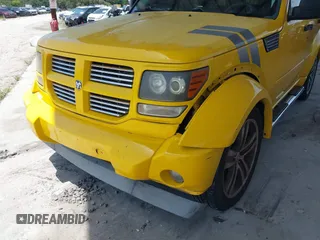 2011 Dodge Nitro z VIN 1D4PU6GX5BW512588, wystawiony jako IAAI lot #42471965 z przebiegiem 115 827 mil mil oraz . Historia ofert i sprzedaży dostępna na DreamBid. Obrazek 13.