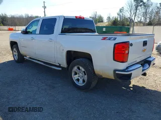 2018 Chevrolet Silverado 1500 LT with VIN 3GCUKREC3JG504431, listed as a IAAI auction lot 41609921 with 192,742 mi miles. Bid and sale history available at carsss.com. Image 3.