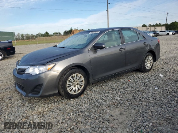 2014 Toyota Camry L with VIN 4T1BF1FK5EU797699, listed as a Copart auction lot 50697855 with 200,463 mi miles and Salvage Title. Bid and sale history available at carsss.com. Image 1.