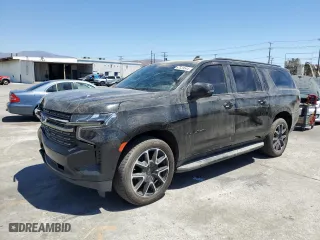 2022 Chevrolet Suburban RST with VIN 1GNSCEKD7NR176874, listed as a Copart auction lot 67539544 with 73,624 mi miles and Salvage Title. Bid and sale history available at carsss.com. Image 1.
