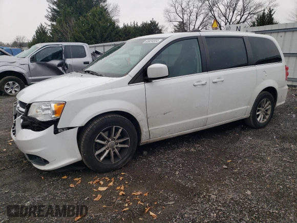 2018 Dodge Grand Caravan SXT z VIN 2C4RDGCG9JR133702, wystawiony jako Copart lot #85824554 z przebiegiem 140 881 mil mil oraz Szkoda całkowita • Salvage title. Historia ofert i sprzedaży dostępna na DreamBid. Obrazek 1.