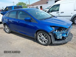 2018 Ford Focus SE with VIN 1FADP3FE8JL239433, listed as a IAAI auction lot 42241003 with 116,481 mi miles and . Bid and sale history available at DreamBid. Image 1.