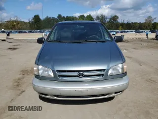 2000 Toyota Sienna LE with VIN 4T3ZF13C2YU286474, listed as a Copart auction lot 74230384 with 118,988 mi miles and Salvage Title. Bid and sale history available at carsss.com. Image 5.