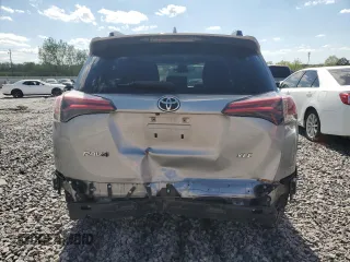 2018 Toyota RAV4 XLE with VIN JTMWFREV6JD112751, listed as a Copart auction lot 51729155 with 99,047 mi miles and Salvage Title. Bid and sale history available at carsss.com. Image 6.