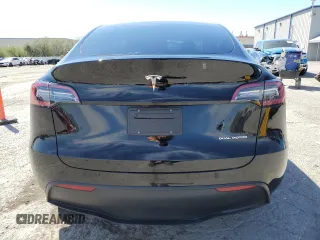 2024 Tesla Model Y Long Range z VIN 7SAYGAEE3RF089122, wystawiony jako Copart lot #52732035 z przebiegiem 15 486 mil mil oraz Szkoda całkowita • Salvage title. Historia ofert i sprzedaży dostępna na DreamBid. Obrazek 6.