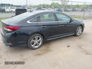 2018 Hyundai Sonata Sport with VIN 5NPE34AF0JH710477, listed as a IAAI auction lot 42104684 with 158,260 mi miles and . Bid and sale history available at carsss.com. Image 4.