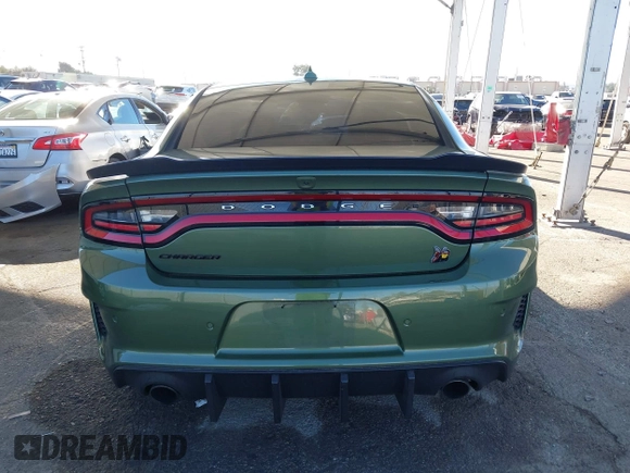 2022 Dodge Charger Scat Pack Widebody with VIN 2C3CDXGJ1NH216763, listed as a IAAI auction lot 41259159 with 32,610 mi miles and . Bid and sale history available at DreamBid. Image 16.