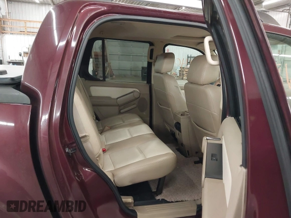 2007 Ford Explorer Sport Trac Limited z VIN 1FMEU53K87UA64421, wystawiony jako IAAI lot #41864051 z przebiegiem 159 350 mil mil oraz . Historia ofert i sprzedaży dostępna na DreamBid. Obrazek 8.