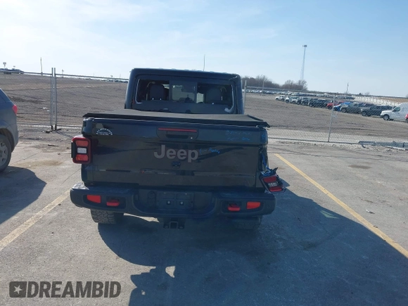 2020 Jeep Gladiator Rubicon with VIN 1C6JJTBG9LL152141, listed as a IAAI auction lot 41798487 with 78,585 mi miles and . Bid and sale history available at DreamBid. Image 18.
