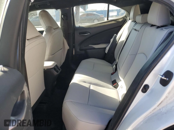 2022 Lexus UX with VIN JTHX3JBH1N2051189, listed as a Copart auction lot 49733245 with 33,265 mi miles and Salvage Title. Bid and sale history available at carsss.com. Image 11.