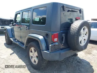 2007 Jeep Wrangler Unlimited Sahara with VIN 1J4GA59117L216687, listed as a IAAI auction lot 42188257 with 176,507 mi miles and . Bid and sale history available at DreamBid. Image 3.