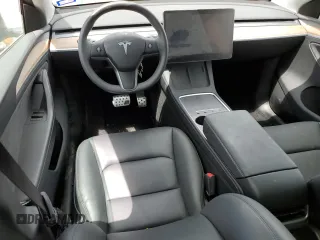 2024 Tesla Model Y Long Range with VIN 7SAYGDEE4RA316722, listed as a Copart auction lot 53207395 with 17,006 mi miles and Salvage title. Bid and sale history available at DreamBid. Image 8.