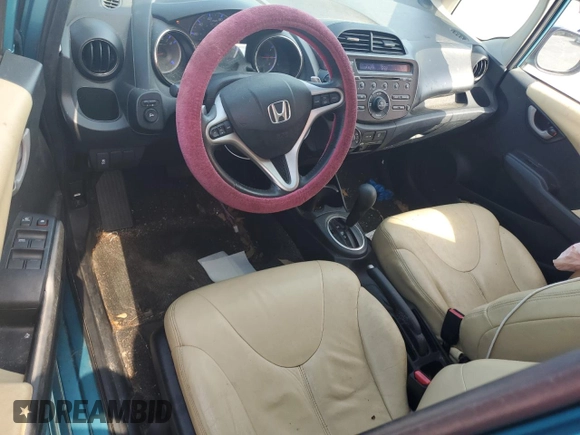 2013 Honda Fit Sport z VIN JHMGE8H50DC006995, wystawiony jako Copart lot #58854875 z przebiegiem 78 207 mil mil oraz Szkoda całkowita • Salvage title. Historia ofert i sprzedaży dostępna na DreamBid. Obrazek 8.