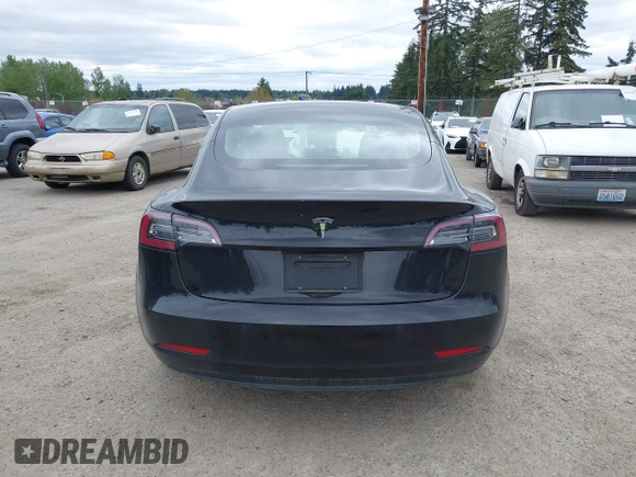 2019 Tesla Model 3 Mid Range with VIN 5YJ3E1EA6KF415656, listed as a IAAI auction lot 42140763 with 71,408 mi miles and . Bid and sale history available at carsss.com. Image 17.