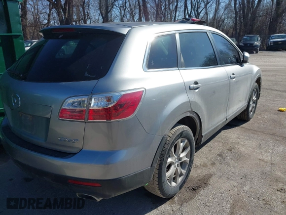 2011 Mazda CX-9 Touring with VIN JM3TB2CA0B0311252, listed as a IAAI auction lot 41497106 with 216,938 mi miles and . Bid and sale history available at DreamBid. Image 4.