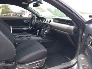 2016 Ford Mustang EcoBoost z VIN 1FA6P8TH6G5263795, wystawiony jako IAAI lot #42310175 z przebiegiem 124 174 mil mil oraz . Historia ofert i sprzedaży dostępna na DreamBid. Obrazek 5.