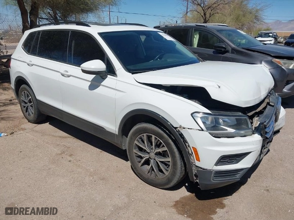 2019 Volkswagen Tiguan SE with VIN 3VV2B7AX1KM092616, listed as a IAAI auction lot 41868660 with 147,419 mi miles. Bid and sale history available at carsss.com. Image 1.