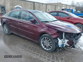 2016 Toyota Avalon Limited with VIN 4T1BK1EB2GU201996, listed as a IAAI auction lot 41720228 with 75,123 mi miles and . Bid and sale history available at carsss.com. Image 1.