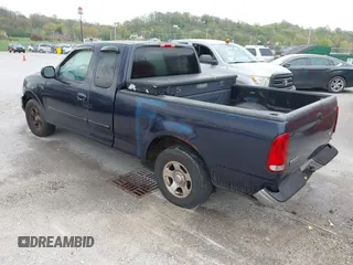 2001 Ford F-150 XL with VIN 1FTZX17211KC05350, listed as a IAAI auction lot 42027246 with 276,822 mi miles and . Bid and sale history available at DreamBid. Image 3.