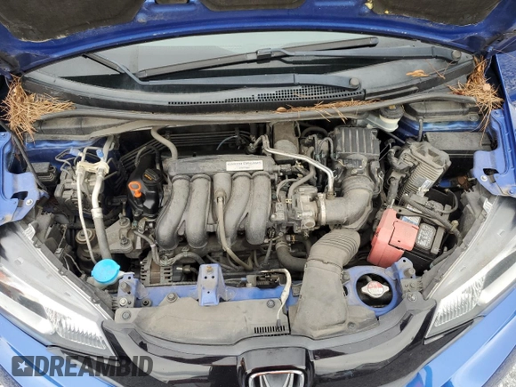 2015 Honda Fit LX with VIN 3HGGK5H50FM726275, listed as a Copart auction lot 56564315 with 123,082 mi miles and Salvage title. Bid and sale history available at DreamBid. Image 11.
