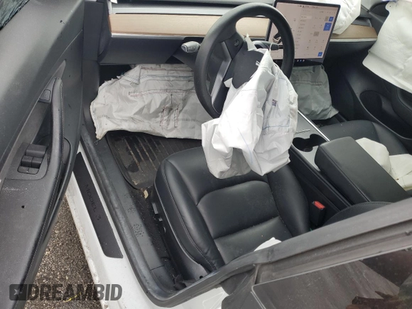 2021 Tesla Model 3 Standard Range Plus z VIN 5YJ3E1EA2MF859832, wystawiony jako Copart lot #56743865 z przebiegiem 77 025 mil mil oraz Nie do naprawy. Historia ofert i sprzedaży dostępna na DreamBid. Obrazek 8.